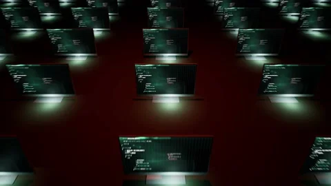 Computers in crowd programming software coding language in dark lights monit 스톡 동영상 229269825