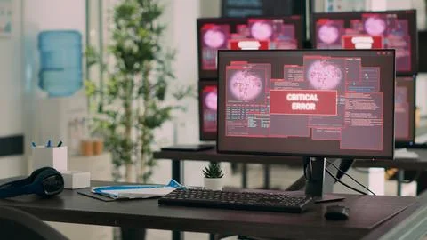 Computers displaying critical error message flashing on screen Stock Photos