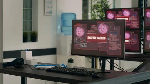 Computers displaying hacking attack alert and security breach Stock-Fotos