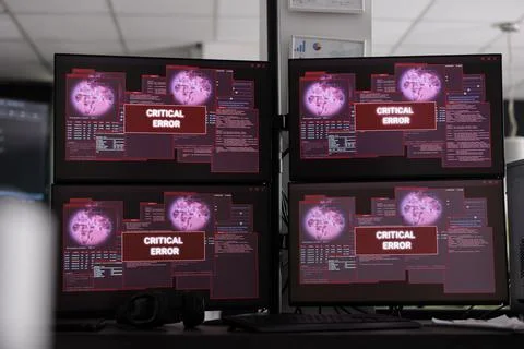 Computers displays having critical error message flashing on screen Foto stock
