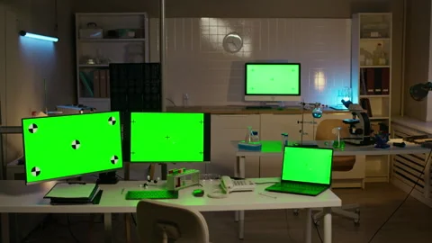 Computers with Green Chroma Key Screens in Modern Scientific Laboratory Stock Footage 332363287