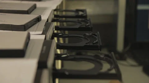 Computers placing cds 2 Stock Footage 30202147