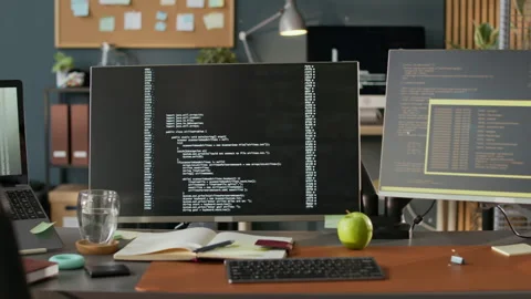 Computers with Running Codes on Screen in Modern Programmers Office Stock Footage 306829730