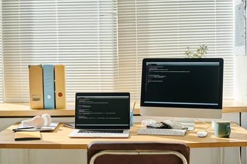 Computers with security codes on the screen Stock Photos