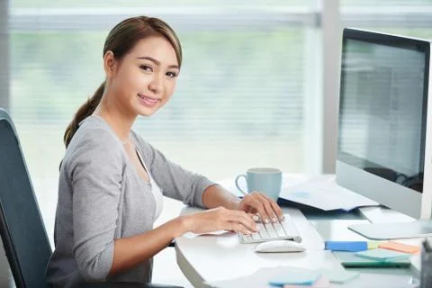 Computing business lady Stock-Fotos