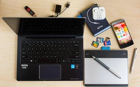  Computing equipment on desk Collection of Windows and Android computing e... Stock Photos