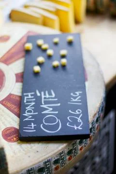 Comte with a price label Stock Photos