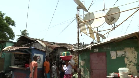 Conakry, Republic of Guinea - June, 20, 2015. Slums of Conakry. African young Stock Footage 166551981