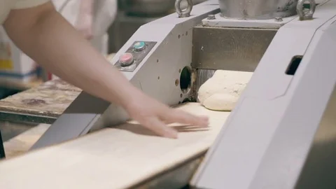 Conbeyor and the dough Stock Footage 76875209