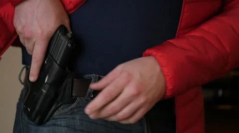 Concealed Gun Drawn From Holster Under Coat, Slow Motion Stock Footage