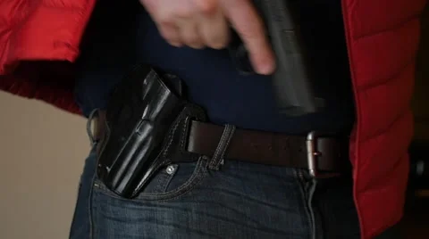Concealed Gun Holstered Under Coat, Slow Motion Stock Footage 58506586