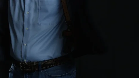 Concealed shoulder holster Stock-Footage 113877194