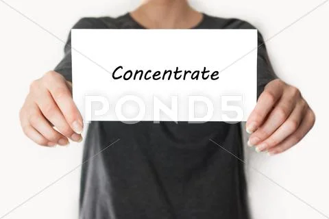 Concentrate. female showing card Stock Photos