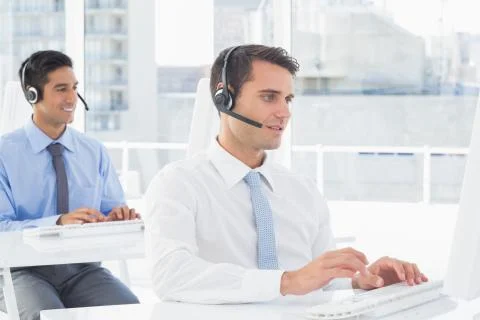 Concentrate work team using computer Stock Photos