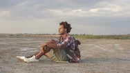 Concentrated Afro American Man Relaxing At The Beach  Stock Footage