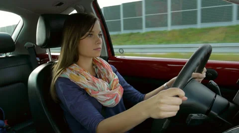 Concentrated car driver Stock Footage 32232324