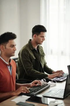 Concentrated Developers Working Stock Photos