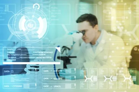 Concentrated doctor using modern microscope while working Foto stock