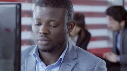 Concentrated employee working on the computer Video stock 73880794