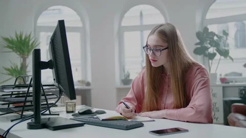 Concentrated Female Student Write Work at Modern Desk. Home Online Education. 스톡 동영상 132526676