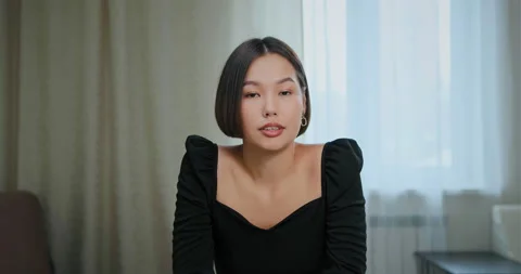 Concentrated freelancer in black blouse talks to employer Stock Footage 146053016