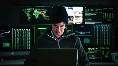 Concentrated hacker man, programmer or developer typing software code on a Stock Footage 232990627