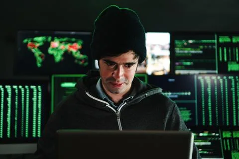 Concentrated hacker man, programmer or developer typing software code on a 스톡 사진