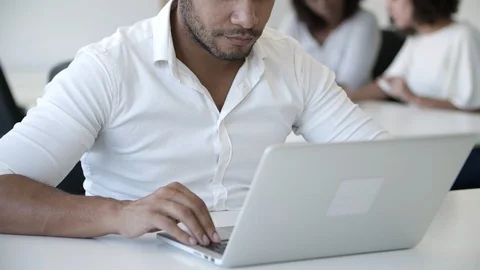 Concentrated handsome programmer working with laptop Stock Footage 117367063