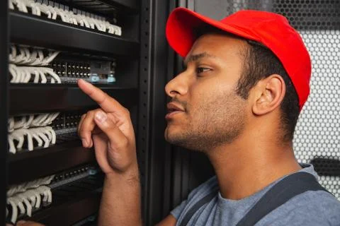 Concentrated IT engineer defining problem Foto stock