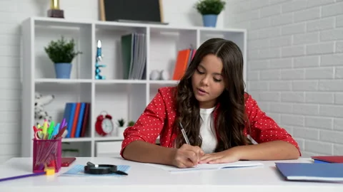 Concentrated kid study writing in modern school, education Stock Footage 200943243