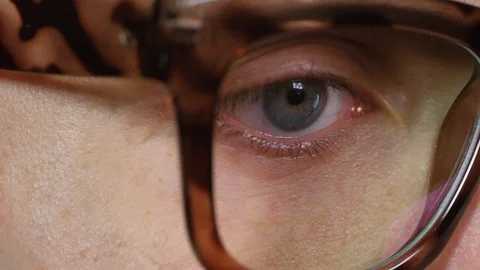 Concentrated Man in Glasses Using Computer Video stock 103527715