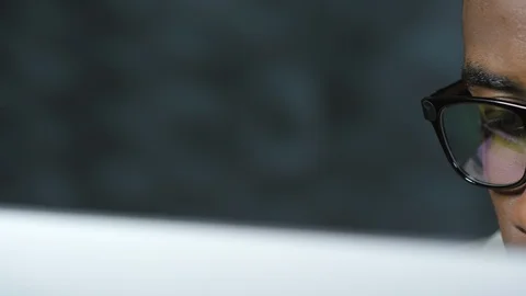Concentrated Man in Glasses Working with Computer Video stock 103526472