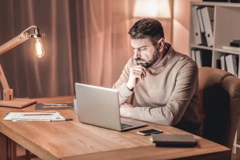 Concentrated man looking at the screen Stock Photos