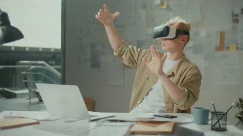 Concentrated Manager Wearing VR Headset during Work with New Project at Office Stock Footage 239107345