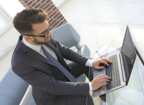 Concentrated professional IT developer with laptop 写真素材