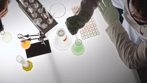 Concentrated Scientists Working in Lab Stock Footage 71002857