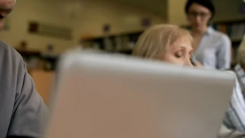 Concentrated Seniors Learning to Use Laptops Stock Footage 99259278