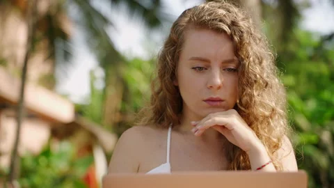 Concentrated thoughtful female thinking of problem solution, works remotely on Stock Footage 237315023