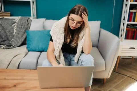 Concentrated woman have problems while working with laptop Freelance concept. 스톡 사진