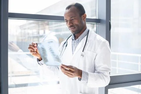 Concentrated young man checking result Stock Photos