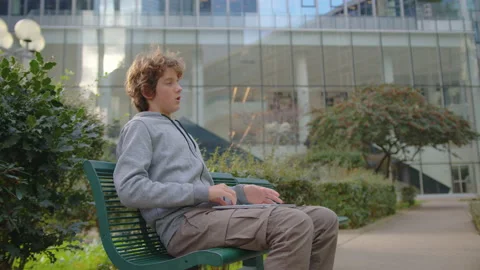 Concentrated young programmer freelancer looking at laptop screen, working Stock Footage 221120003