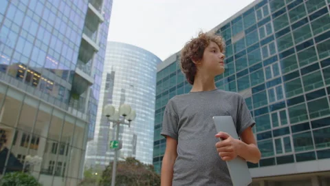 Concentrated young programmer freelancer outdoor Stock Footage 220778354