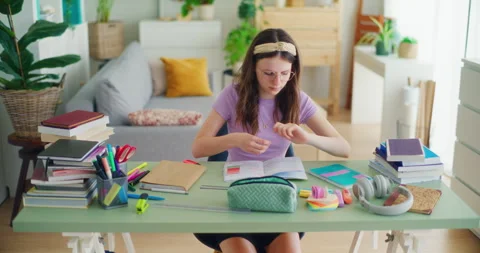 Concentrated Young Student Doing Homework and Solving Math Problems Stock Footage 277138543