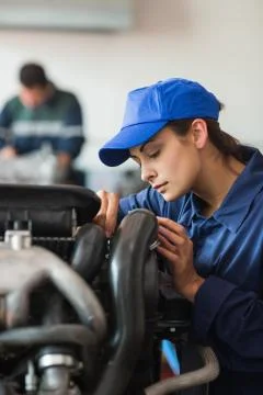 Concentrating trainee checking machine Stock Photos