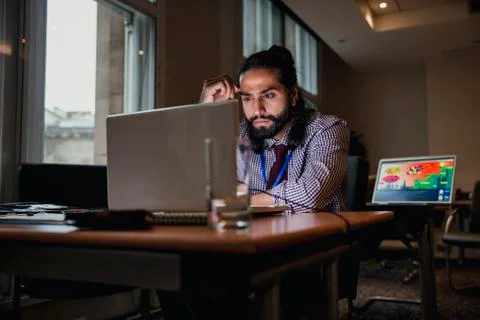 Concentrating on Work in the Office Fotos Stock