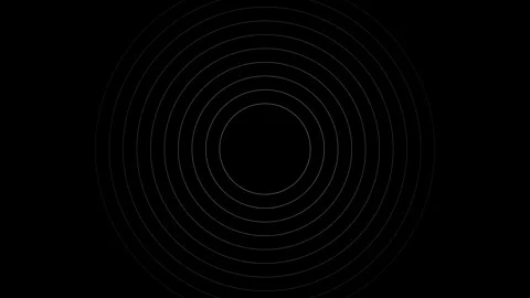 Concentric circles formed by glowing white dots on a deep black background Video stock 335117184