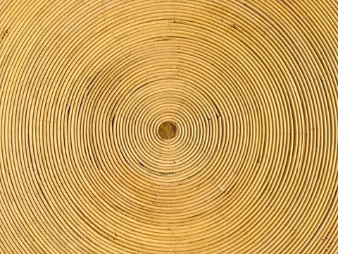 Concentric circles forming hypnotic pattern on rattan surface Stock Photos