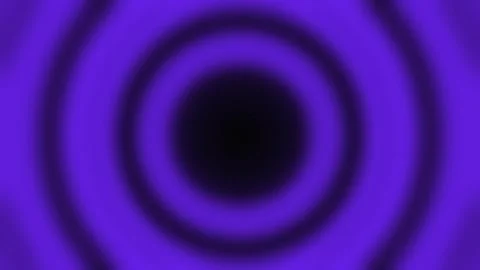 Concentric circles of purple light expanding outwards with a dark center in.. Stock Footage 340941664