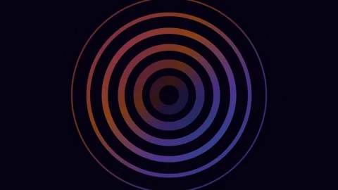 Concentric circles with a vibrant orange to violet color gradient effect Stockbeeldmateriaal 338310214