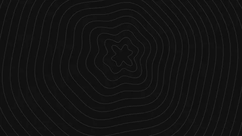 Concentric rings forming an abstract ripple pattern on a pitch black background Video stock 335117882